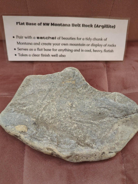 Unfinished art bases shaped like a belt rock, made by Pleistoscene, showcasing rugged, natural stone textures.