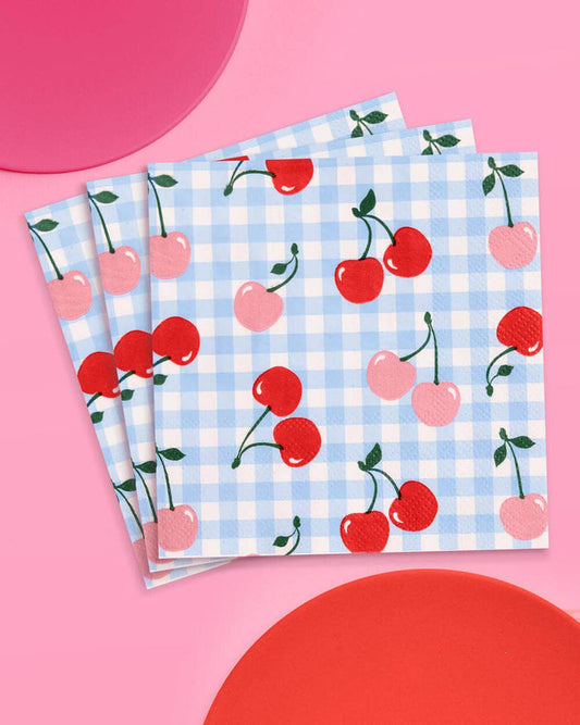 Set of 25 Gingham cherry-themed paper napkins by xo Fetti, ideal for picnics and birthday parties.