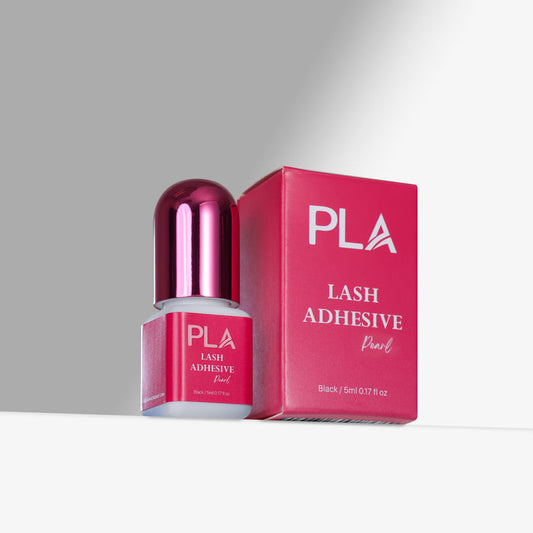 PLA lash adhesive bottle and packaging on a gray background