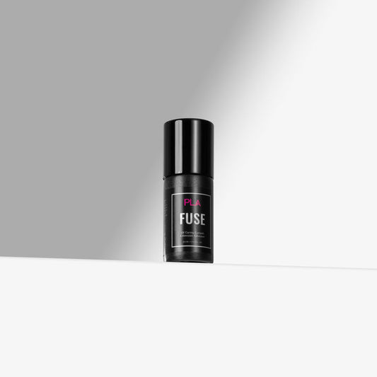 Black adhesive bottle with 'FUSE' text on a gray background